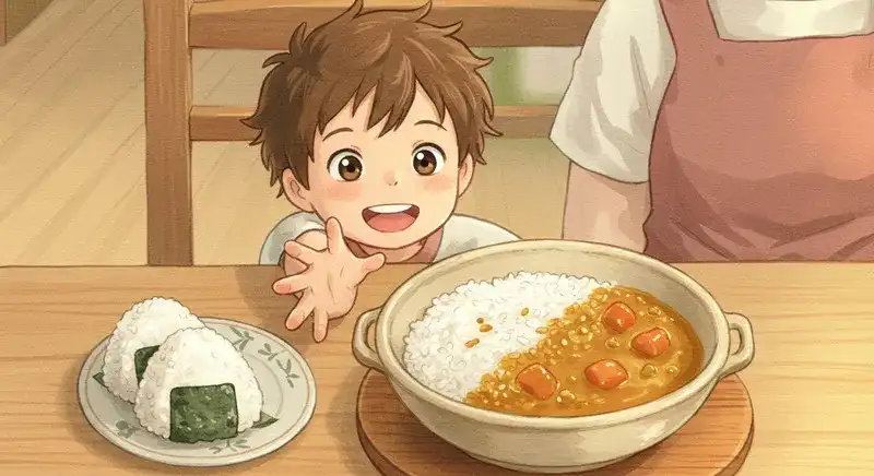 食卓に並ぶカレーやおにぎりを子どもが手に取ろうとしている